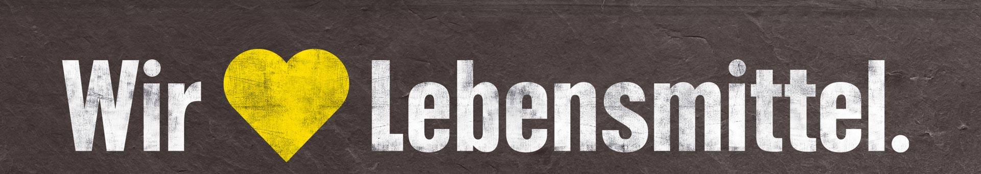 Slogan Wir lieben Lebensmittel auf Kreidetafel
